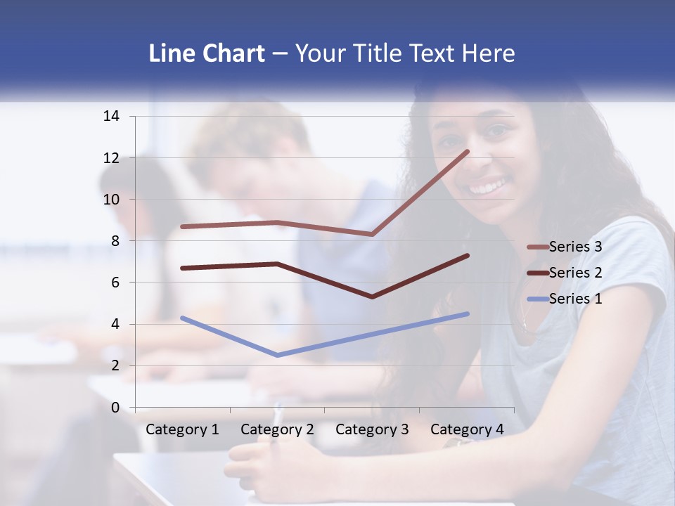 A Woman Sitting At A Desk In A Classroom PowerPoint Template