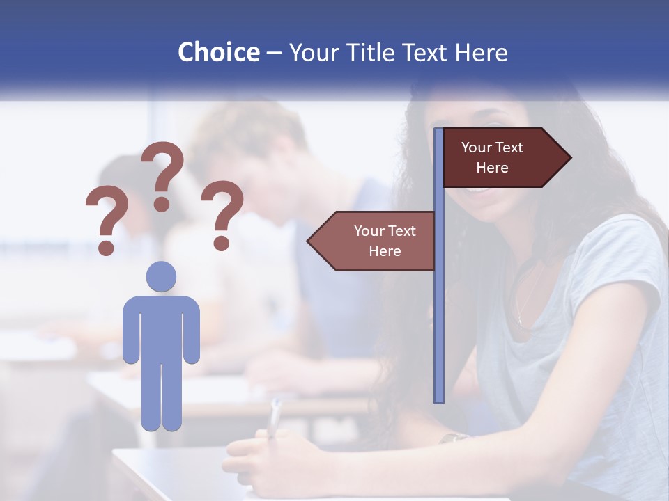 A Woman Sitting At A Desk In A Classroom PowerPoint Template
