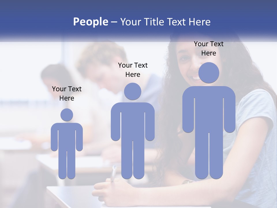 A Woman Sitting At A Desk In A Classroom PowerPoint Template