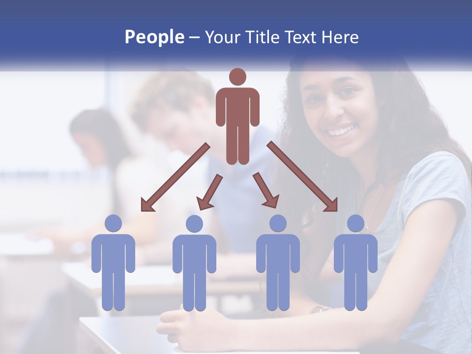 A Woman Sitting At A Desk In A Classroom PowerPoint Template