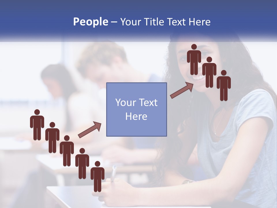 A Woman Sitting At A Desk In A Classroom PowerPoint Template