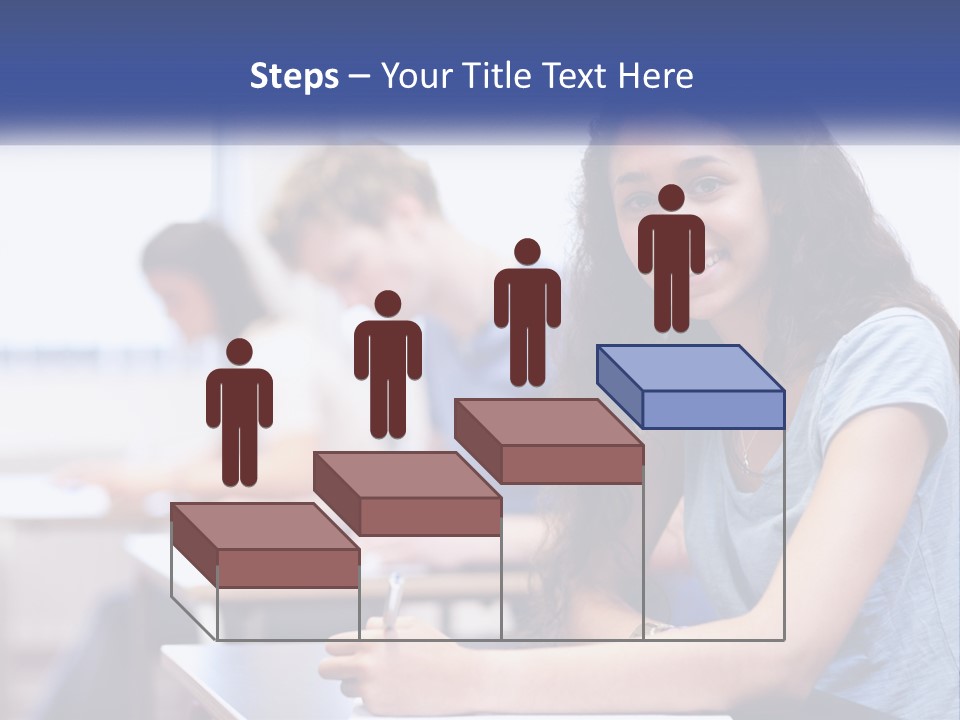 A Woman Sitting At A Desk In A Classroom PowerPoint Template