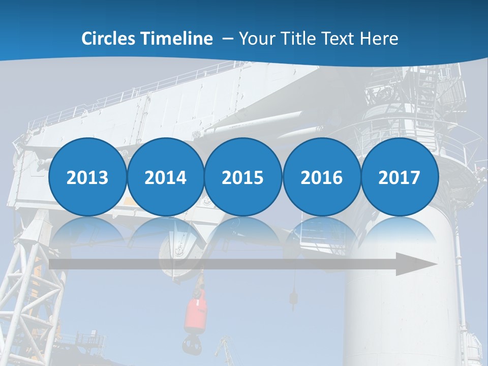 A Crane Is Lifting A Large Piece Of Equipment PowerPoint Template