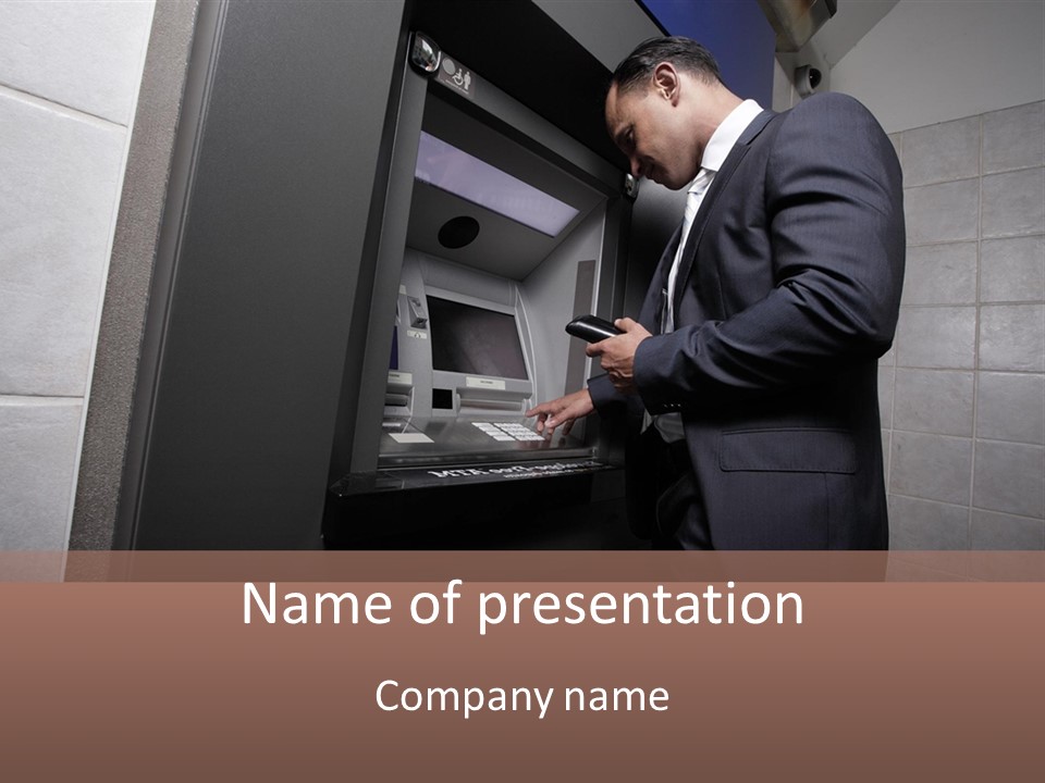 A Man In A Suit Is Using An Atm Machine PowerPoint Template