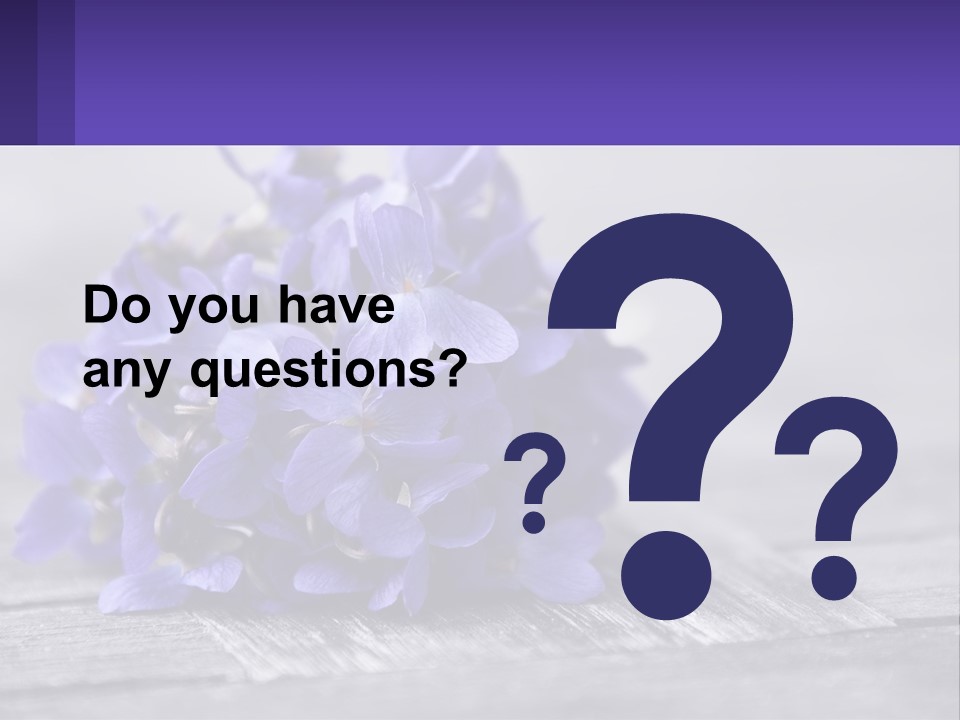 A Bunch Of Purple Flowers Sitting On Top Of A Wooden Table PowerPoint Template