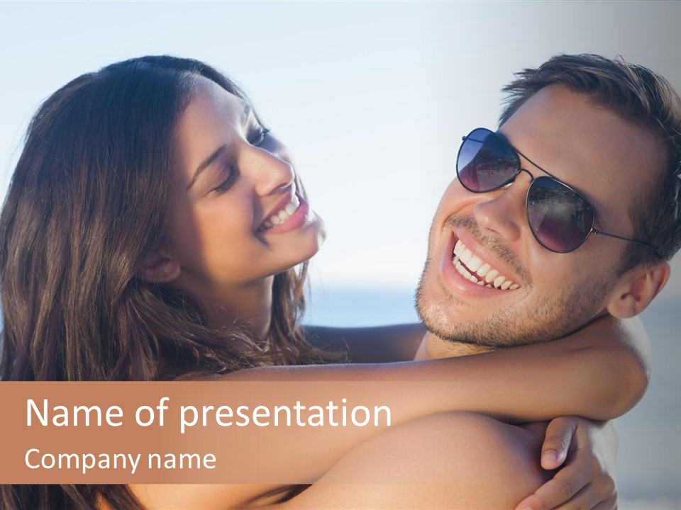 A Man Holding A Woman In His Arms PowerPoint Template