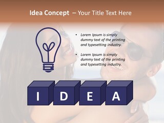A Man Holding A Woman In His Arms PowerPoint Template
