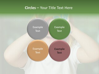 A Little Girl Holding Her Hands Up To Her Face PowerPoint Template