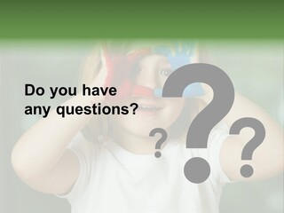 A Little Girl Holding Her Hands Up To Her Face PowerPoint Template
