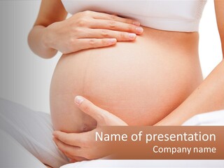 A Pregnant Woman Holding Her Belly In Her Hands PowerPoint Template