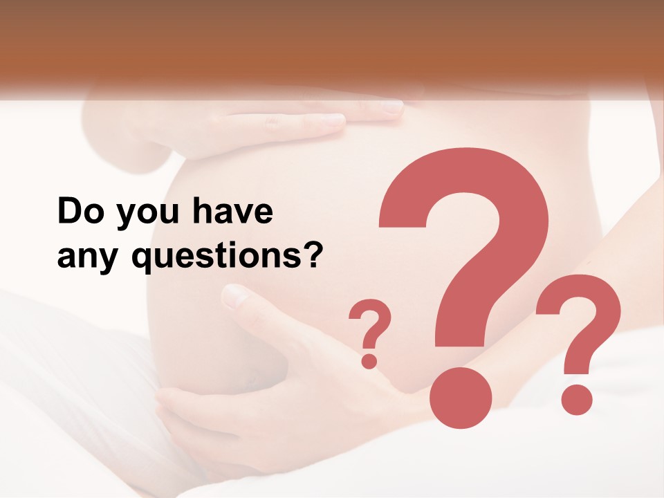 A Pregnant Woman Holding Her Belly In Her Hands PowerPoint Template