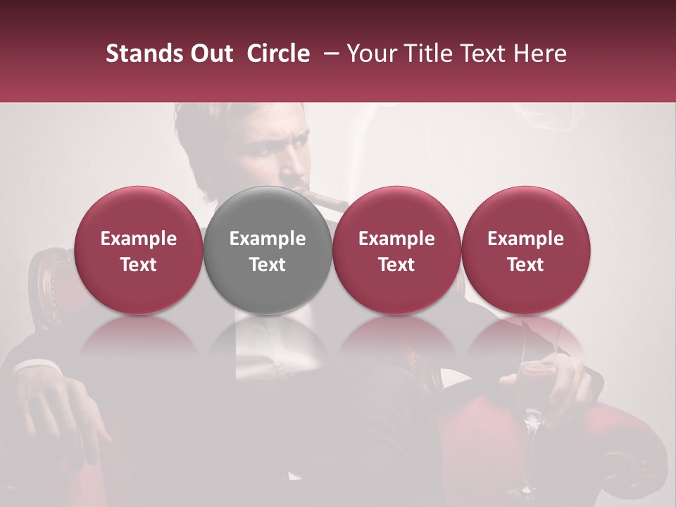 A Man Sitting In A Chair With A Cigarette In His Mouth PowerPoint Template