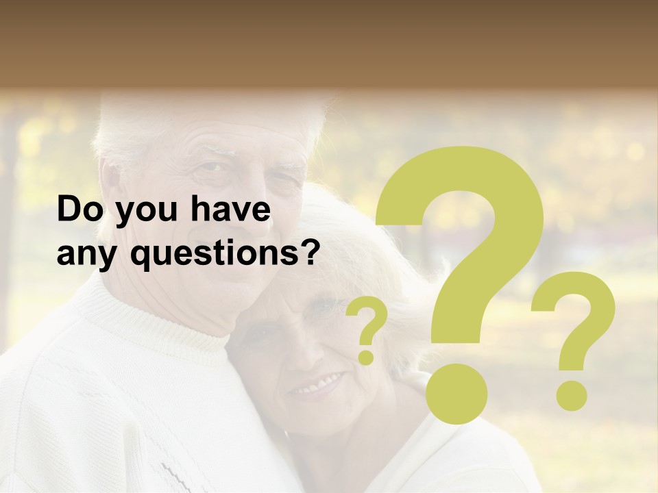 An Elderly Couple Is Smiling For The Camera PowerPoint Template