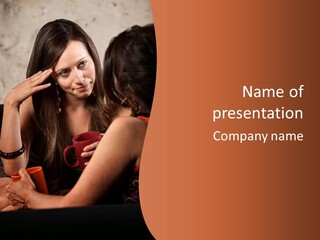 Two Women Sitting At A Table Talking To Each Other PowerPoint Template