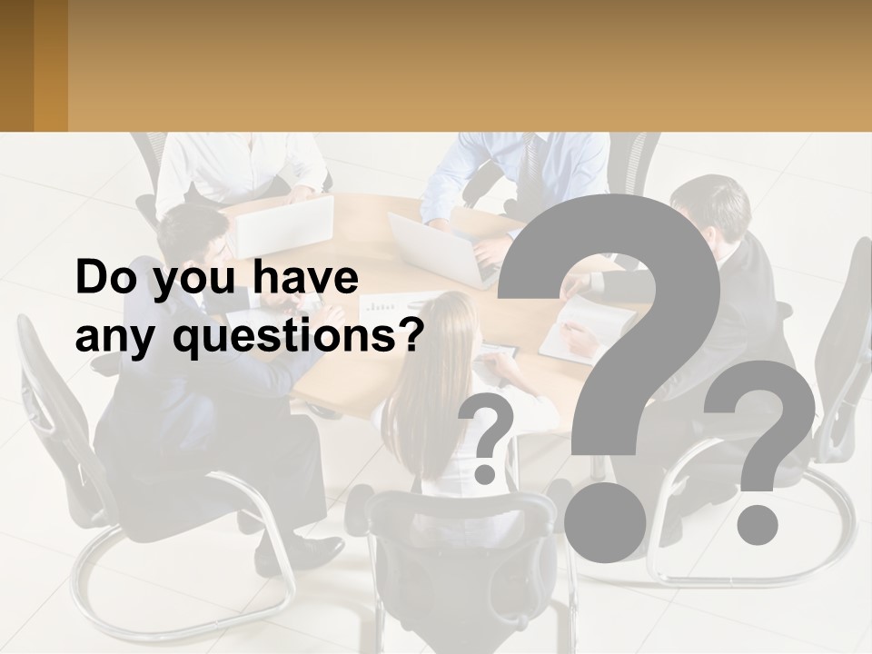 A Group Of People Sitting Around A Table With Laptops PowerPoint Template