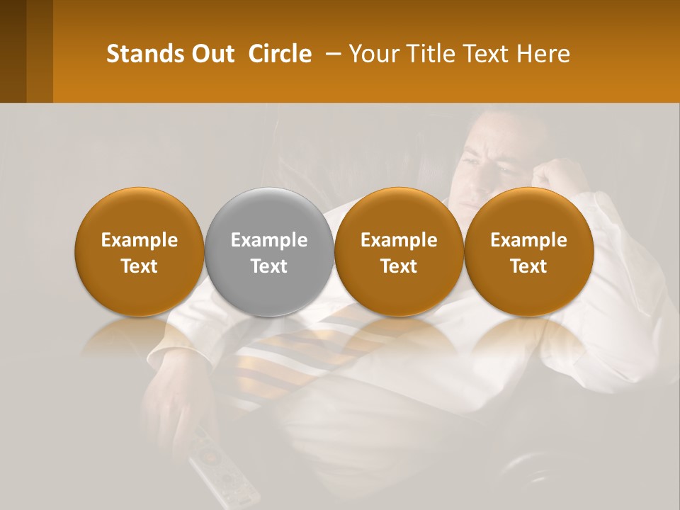 A Man Sitting On A Couch With A Tie On PowerPoint Template