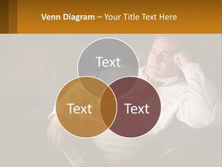 A Man Sitting On A Couch With A Tie On PowerPoint Template