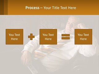 A Man Sitting On A Couch With A Tie On PowerPoint Template