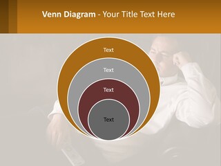 A Man Sitting On A Couch With A Tie On PowerPoint Template