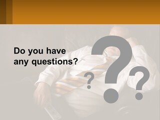 A Man Sitting On A Couch With A Tie On PowerPoint Template