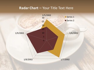 A Cup Of Coffee On A Saucer On A Wooden Table PowerPoint Template