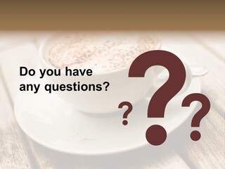 A Cup Of Coffee On A Saucer On A Wooden Table PowerPoint Template