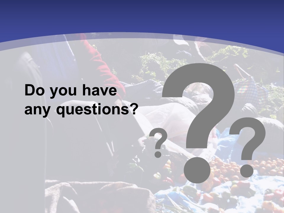 A Group Of People Sitting Around A Table Full Of Vegetables PowerPoint Template