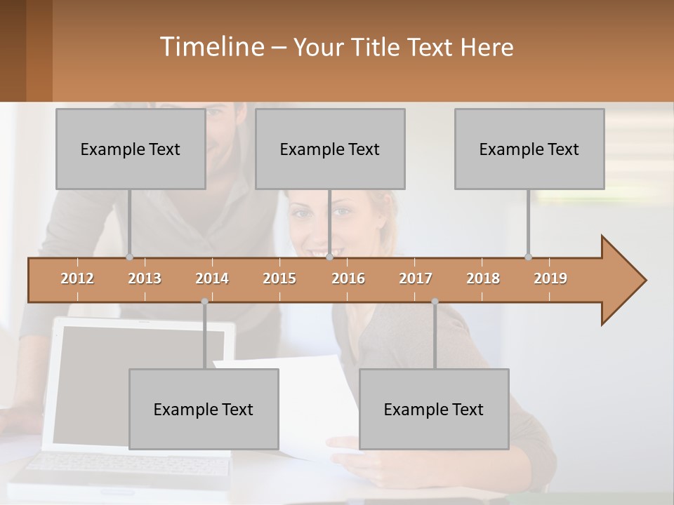 A Man And A Woman Looking At A Laptop Screen PowerPoint Template