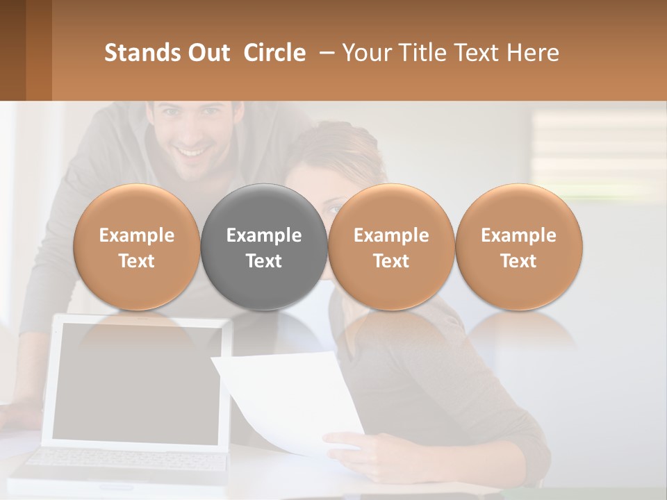 A Man And A Woman Looking At A Laptop Screen PowerPoint Template