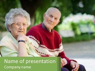 A Couple Of Elderly People Sitting On A Bench PowerPoint Template