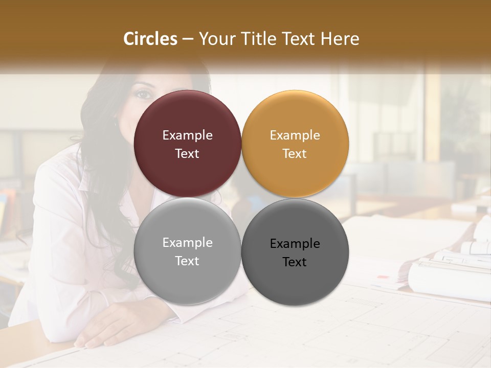 A Woman Sitting At A Desk In An Office PowerPoint Template