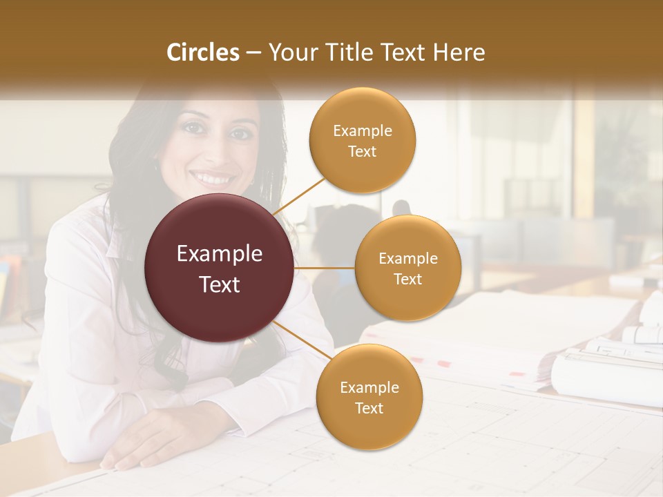 A Woman Sitting At A Desk In An Office PowerPoint Template