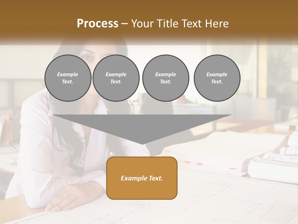 A Woman Sitting At A Desk In An Office PowerPoint Template