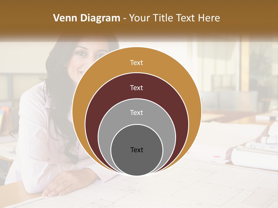 A Woman Sitting At A Desk In An Office PowerPoint Template