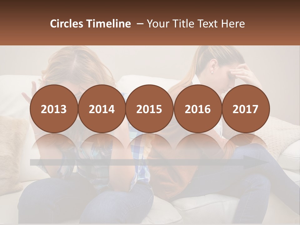 Two Women Sitting On A Couch With Their Hands On Their Head PowerPoint Template