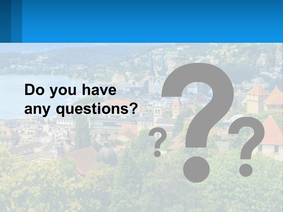 A Scenic View Of A City With Mountains In The Background PowerPoint Template