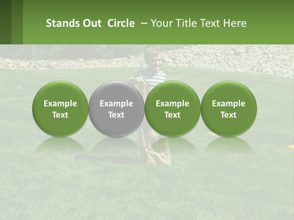 A Young Boy Standing On Top Of A Lush Green Field PowerPoint Template