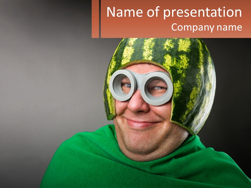 A Man Wearing A Watermelon Helmet And Goggles PowerPoint Template
