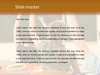 A Group Of Children Raising Their Hands In A Classroom PowerPoint Template