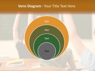 A Group Of Children Raising Their Hands In A Classroom PowerPoint Template
