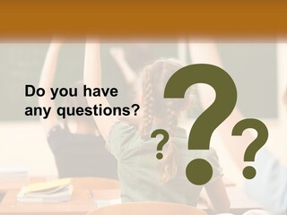 A Group Of Children Raising Their Hands In A Classroom PowerPoint Template