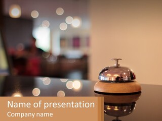 A Table With A Bell On Top Of It PowerPoint Template