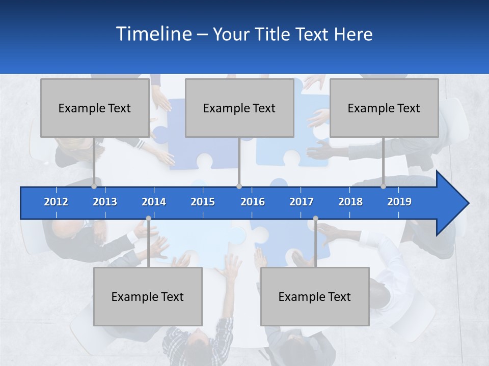 A Group Of People Holding Puzzle Pieces Together PowerPoint Template
