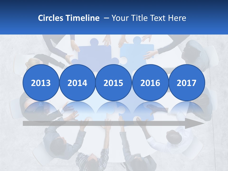 A Group Of People Holding Puzzle Pieces Together PowerPoint Template