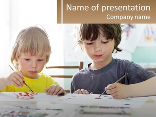 Two Children Sitting At A Table With Paper And Paint PowerPoint Template