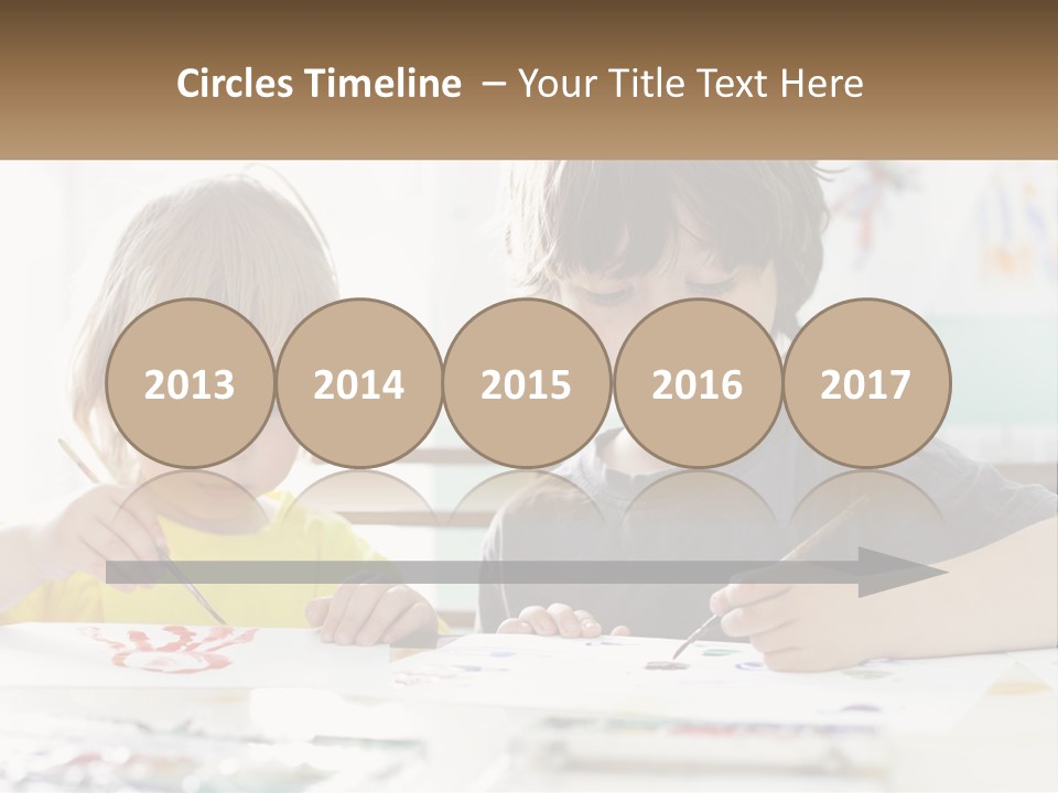 Two Children Sitting At A Table With Paper And Paint PowerPoint Template