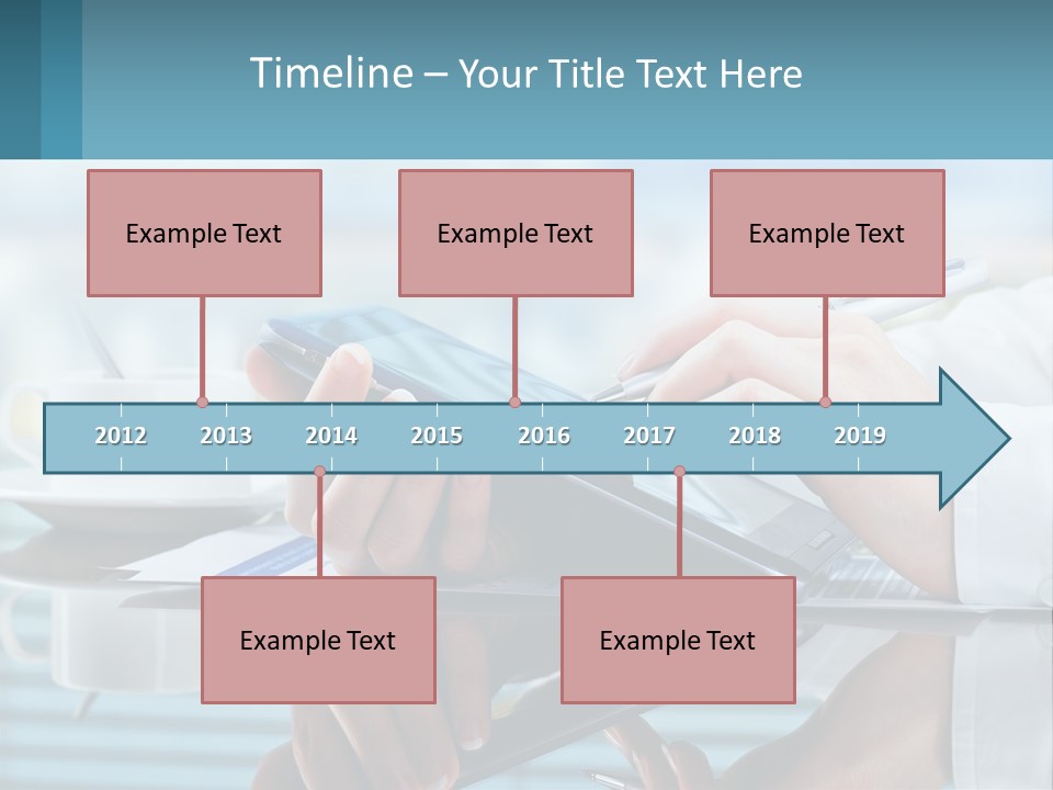 A Person Using A Laptop Computer On A Desk PowerPoint Template