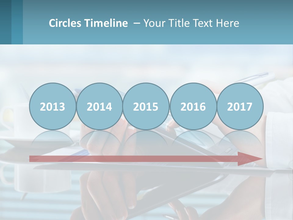 A Person Using A Laptop Computer On A Desk PowerPoint Template