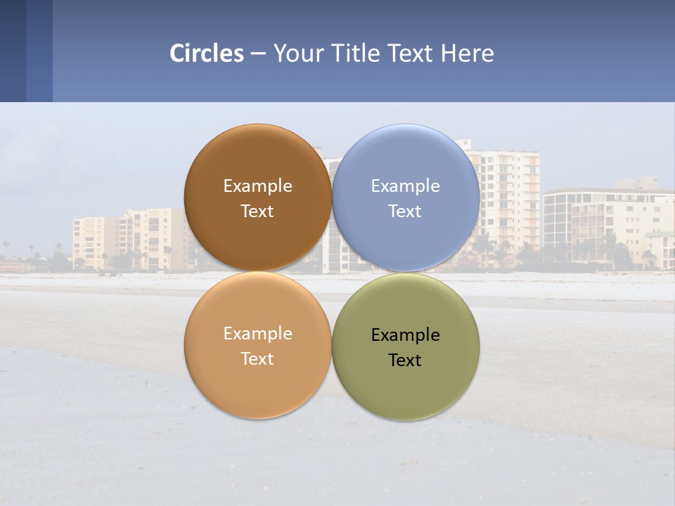 A Sandy Beach With Buildings In The Background PowerPoint Template