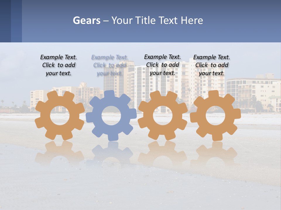 A Sandy Beach With Buildings In The Background PowerPoint Template